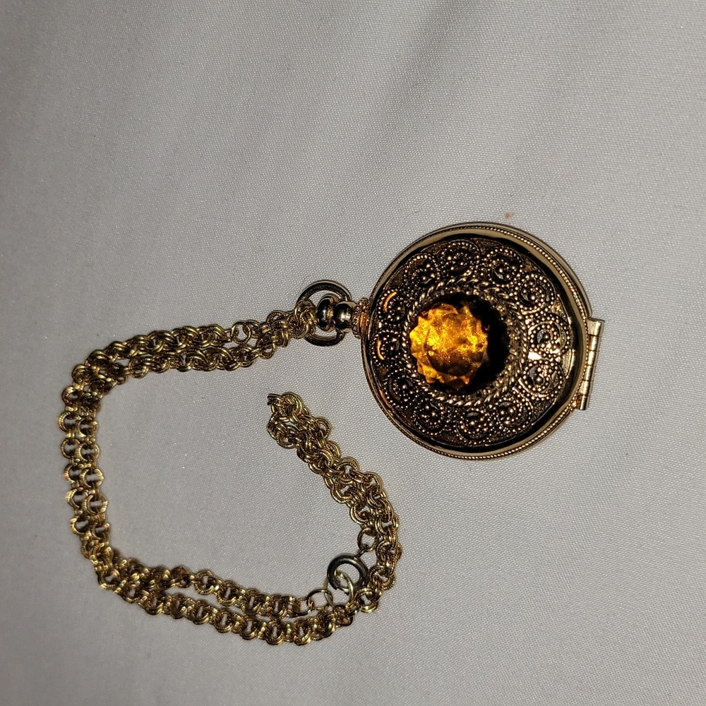 Gold tone Victorian style locket